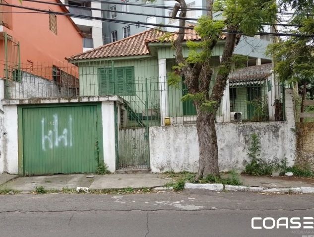 Terreno cm chalé de madeira no bairro Rosário próximo a UFN
