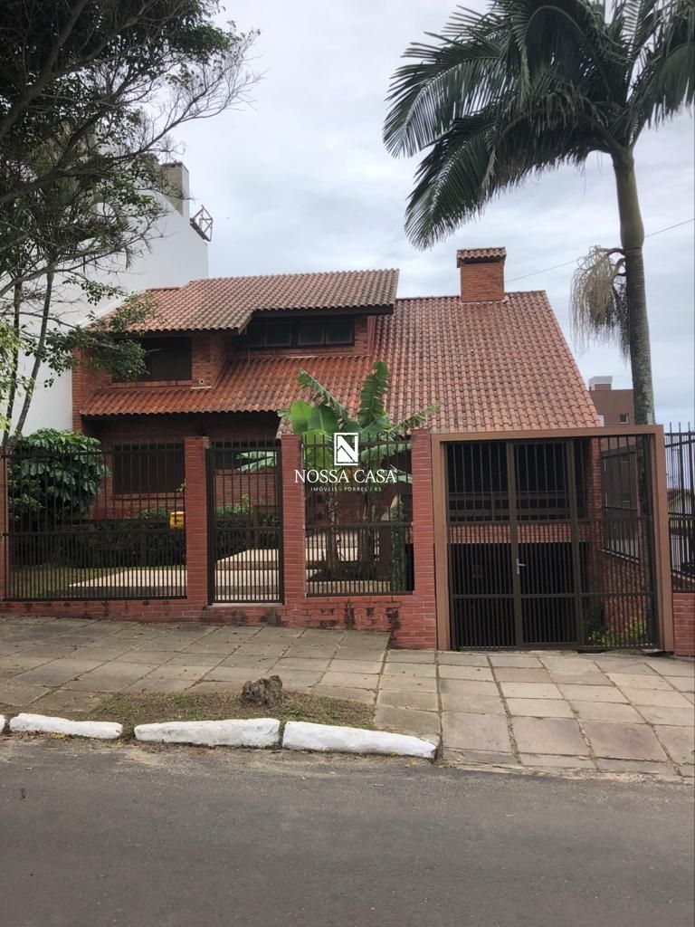 Casa à venda com 9 quartos, 420m² - Foto 1