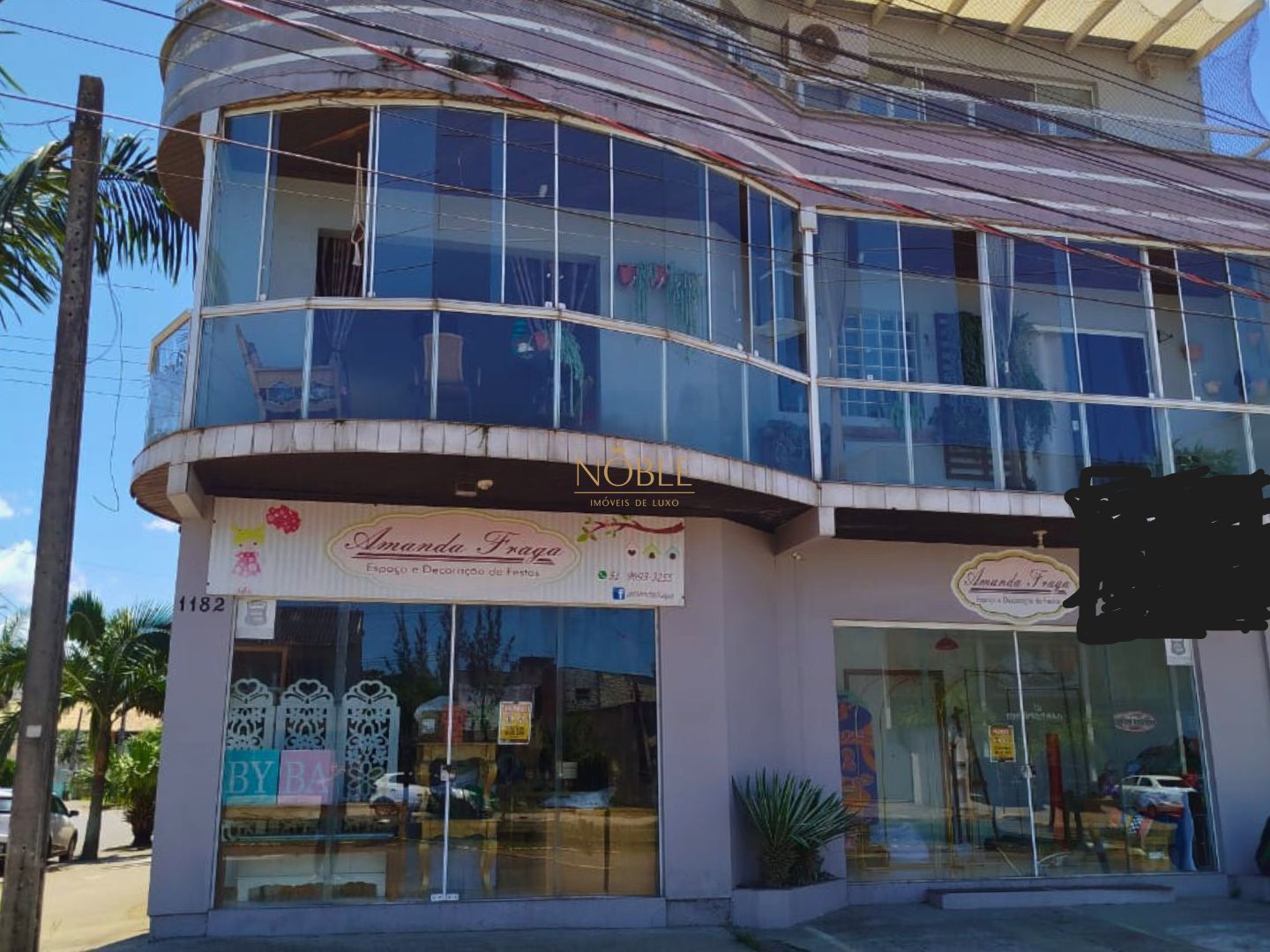 Prédio Comercial com 126m², 2 dormitórios, 2 vagas no bairro Centro em Torres para Comprar