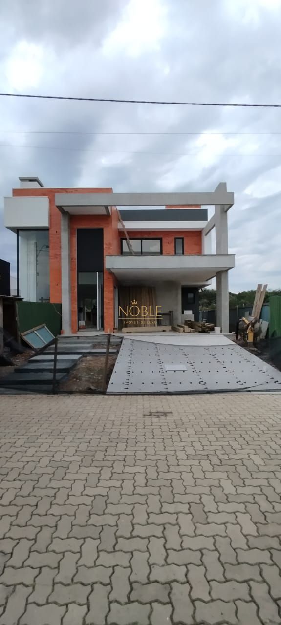 Casa de Condomínio com 204m², 3 dormitórios, 3 suítes, 2 vagas no Reserva das Águas em Torres para Comprar