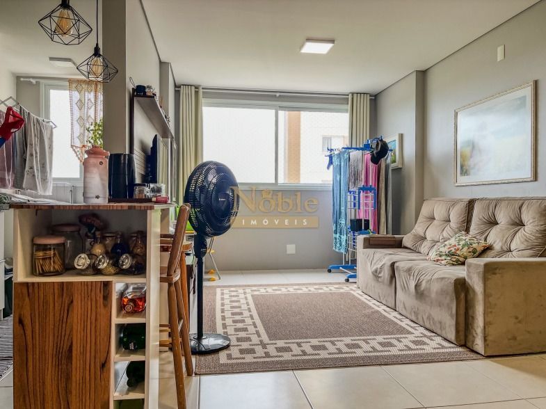 Apartamento com 60m², 2 dormitórios, 1 suíte, 1 vaga no Residencial Jardim Europa em Torres para Comprar