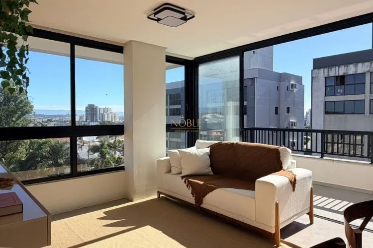 Apartamento com 64m², 2 dormitórios, 1 suíte, 1 vaga no Aston em Torres para Comprar