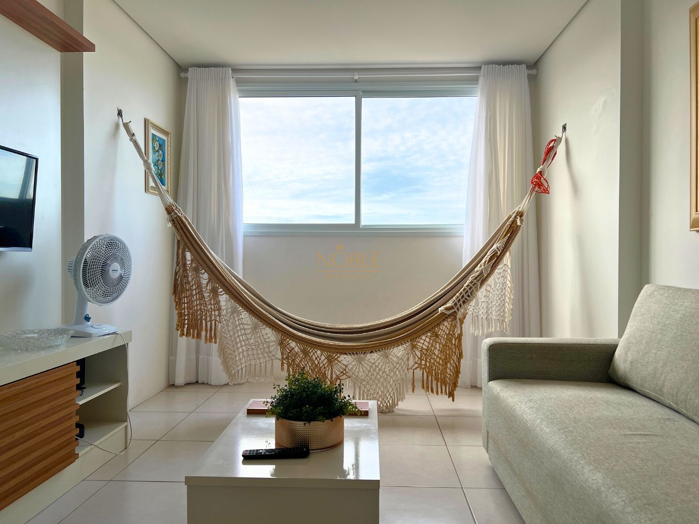 Apartamento com 59m², 2 dormitórios, 1 suíte, 1 vaga no Residencial Jardim Europa em Torres para Comprar