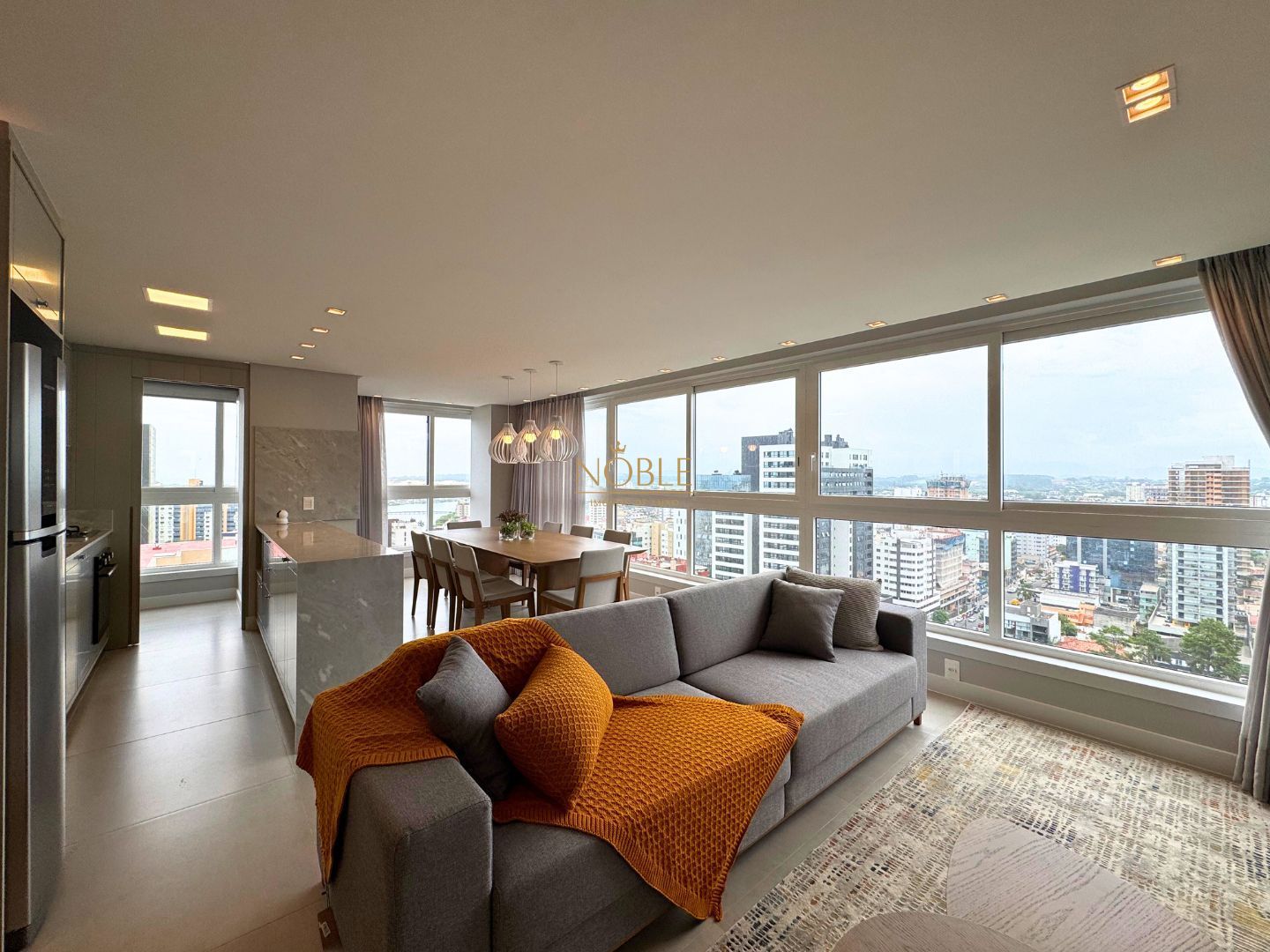 Apartamento com 102m², 3 dormitórios, 1 suíte, 2 vagas no Maui Residencial em Torres para Comprar