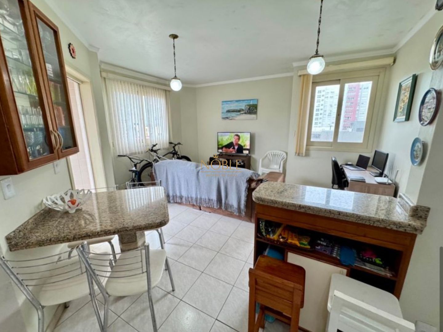 Apartamento com 65m², 2 dormitórios, 1 vaga no Edifício Porto Seguro em Torres para Comprar