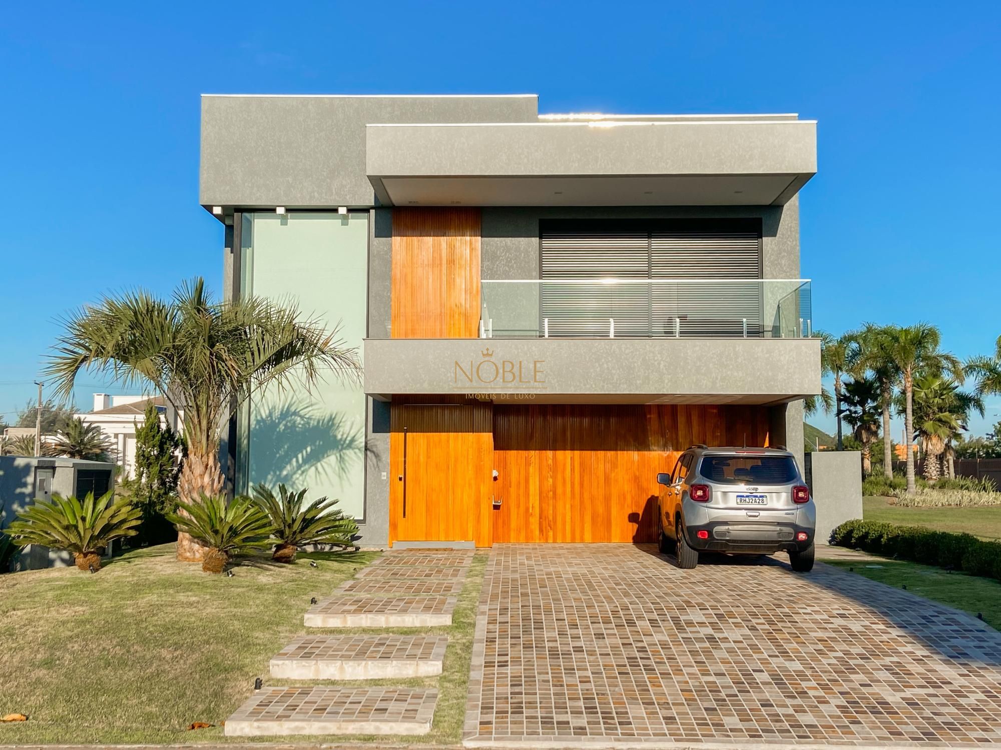 Casa de Condomínio com 375m², 4 dormitórios, 4 suítes, 2 vagas no Condomínio Ilhas Park em Torres para Comprar