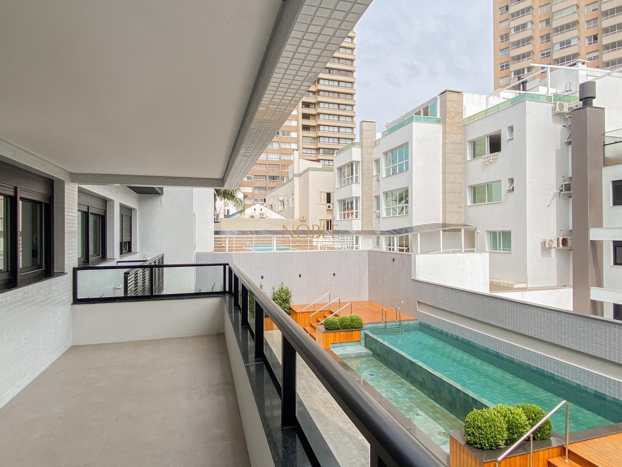 Apartamento com 83m², 2 dormitórios, 1 suíte, 2 vagas no Residencial Exclusive em Torres para Comprar