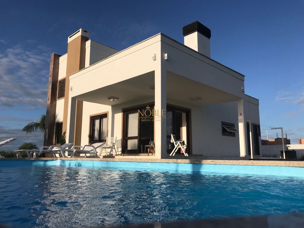 Casa de Condomínio com 416m², 3 dormitórios, 1 suíte, 2 vagas no Reserva das Águas em Torres para Comprar