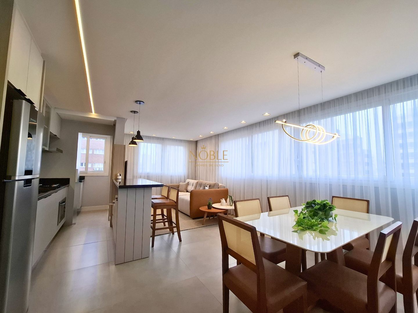 Apartamento com 77m², 2 dormitórios, 1 suíte, 2 vagas no Maui Residencial em Torres para Comprar