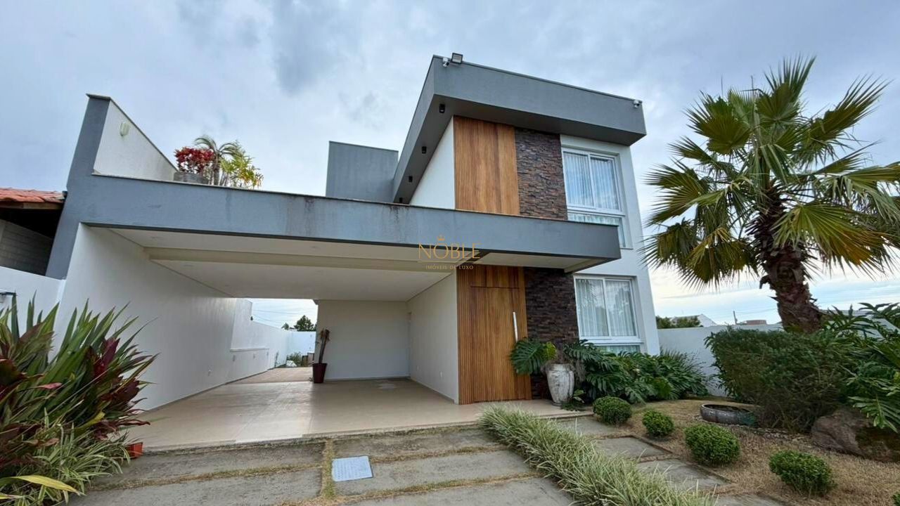 Casa com 180m², 3 dormitórios, 1 suíte, 4 vagas no bairro Novo Passo em Passo de Torres para Comprar