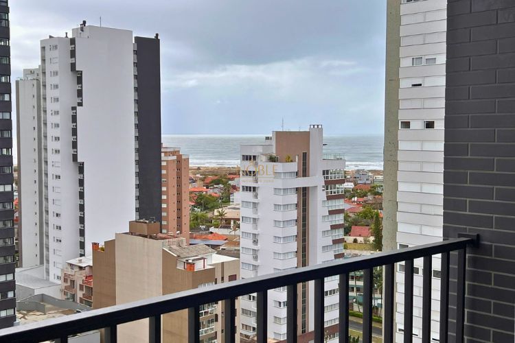 Apartamento com 70m², 2 dormitórios, 1 suíte, 2 vagas no Toronto em Torres para Comprar