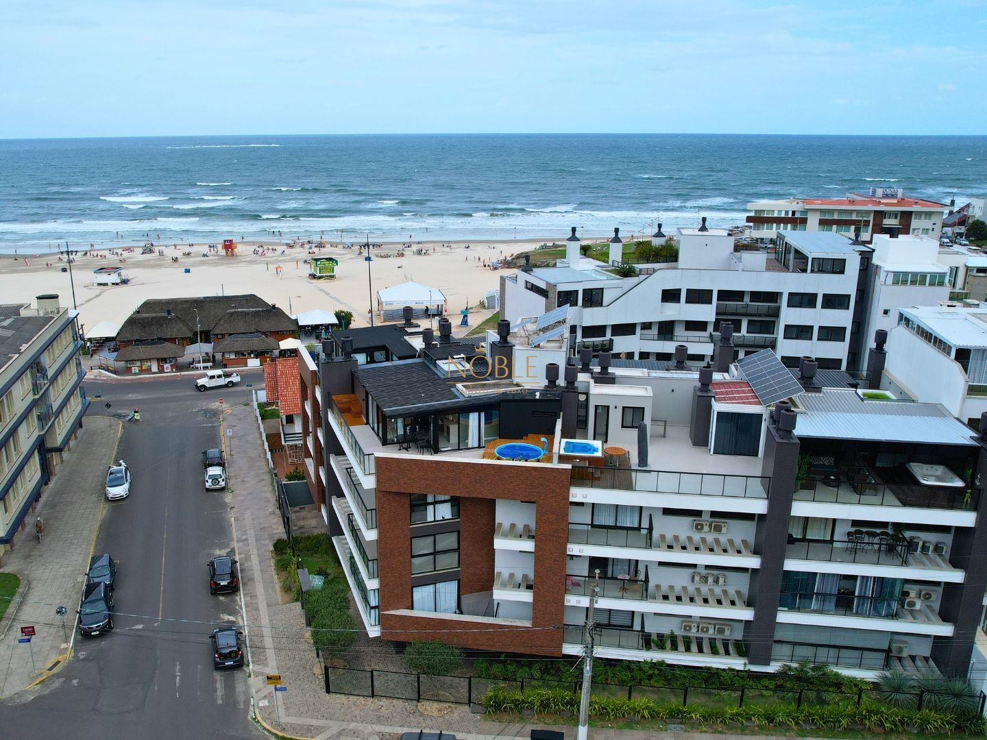 Apartamento com 71m², 2 dormitórios, 1 suíte, 2 vagas no Residencial DI Capri em Torres para Comprar