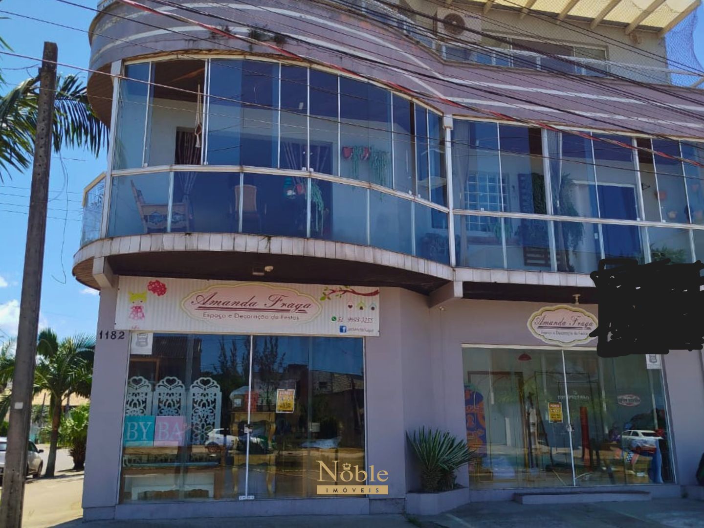 Prédio Comercial com 126m², 2 dormitórios, 2 vagas no bairro Centro em Torres para Comprar