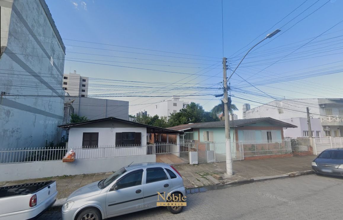 Casa, 2 dormitórios, 1 suíte, 2 vagas no bairro Centro em Torres para Comprar