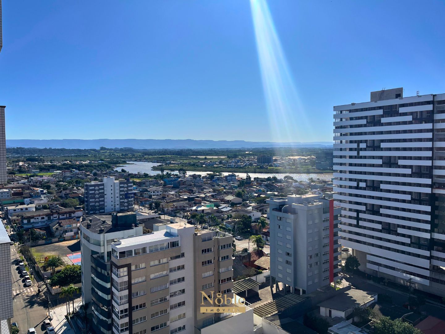 Apartamento com 97m², 2 dormitórios, 2 suítes, 2 vagas no Origem em Torres para Comprar