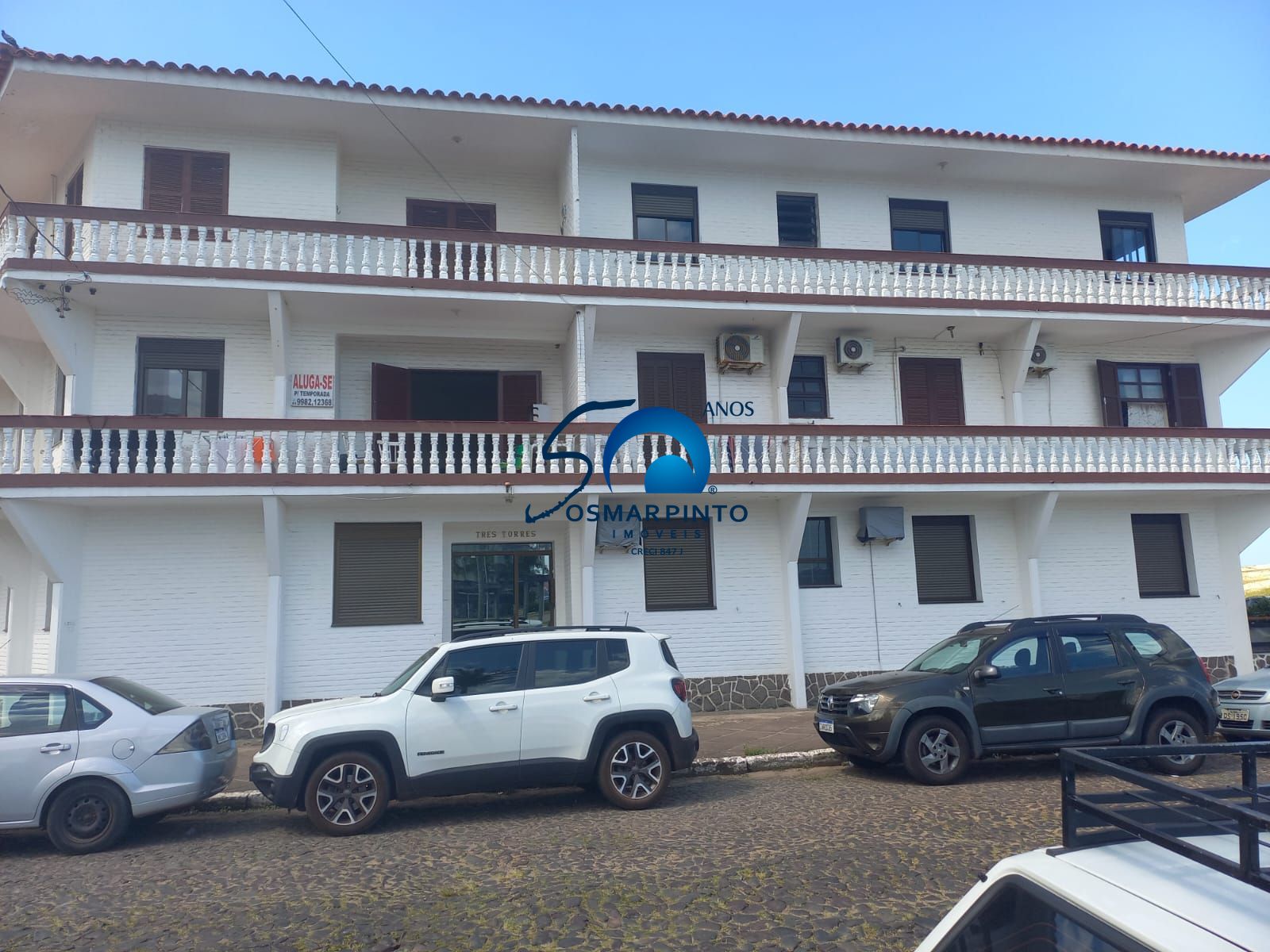 apartamento beira mar a venda em torres