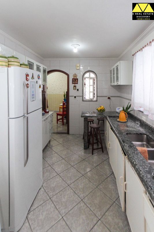 Casa à venda com 4 quartos, 208m² - Foto 18