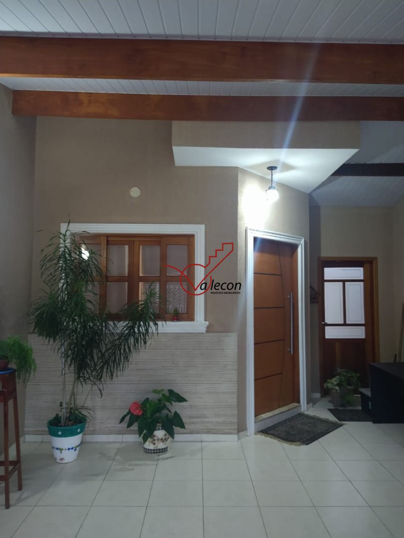 Casa à venda com 3 quartos, 125m² - Foto 1