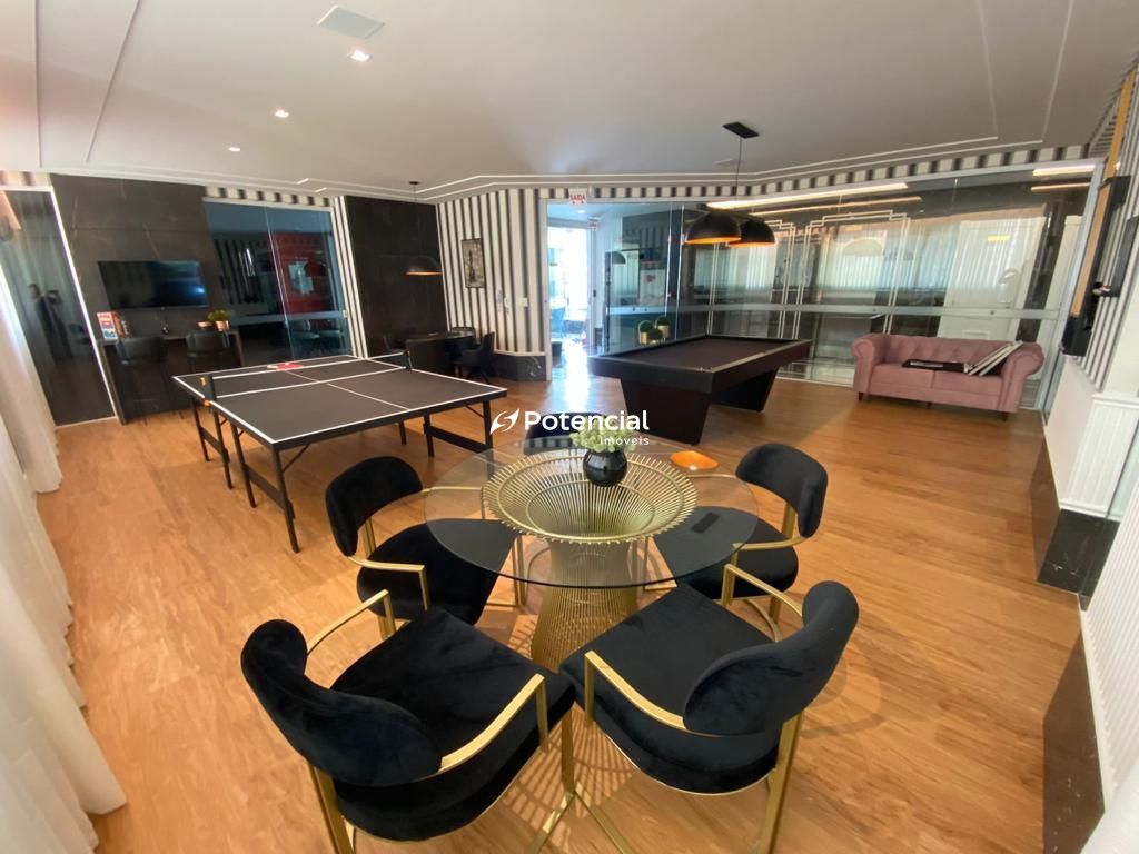 Sala de jogos com mesa de pingpong l Arnou Teixeira de Mello Residence