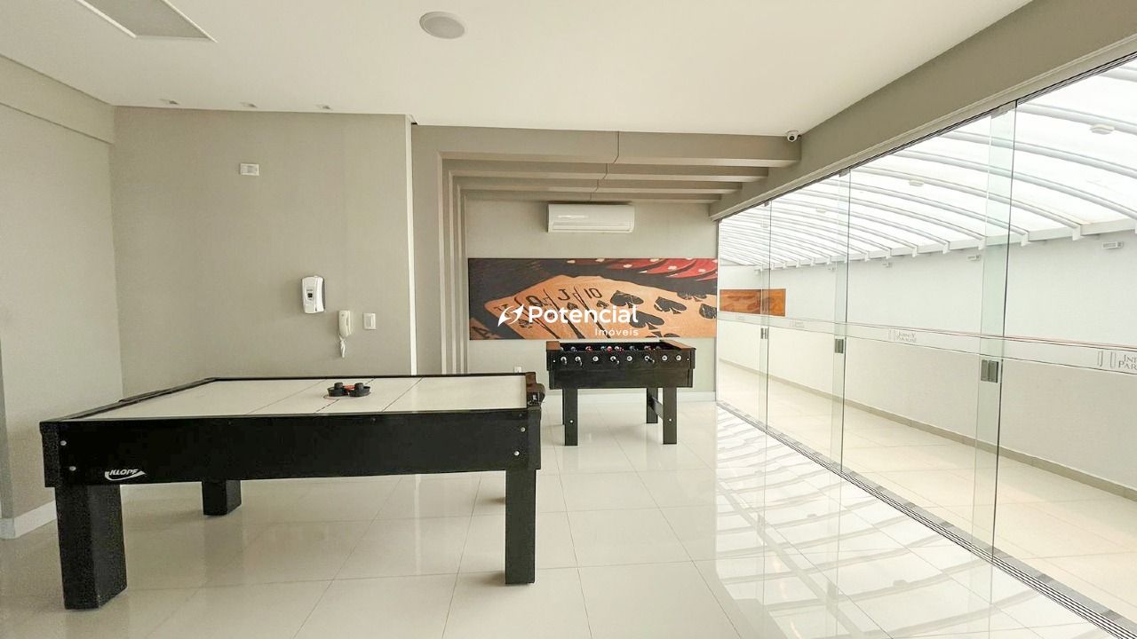Mesa de air rockey na sala de jogos Infinity Paradise Residence