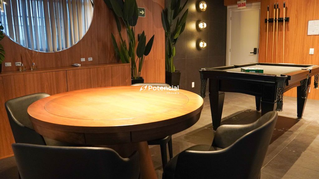 Sala de jogos com mesa de carteado l Torres do Caribe Residence