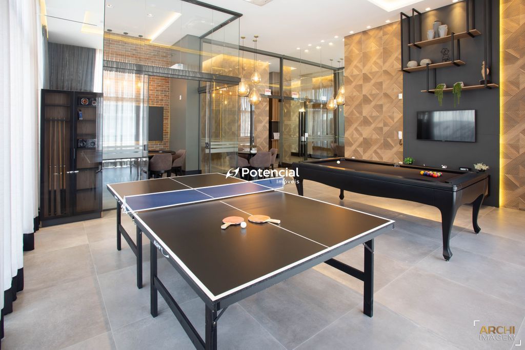 Sala de jogos com mesa de pingpong e mesa de snooker Saint Laurent Residence