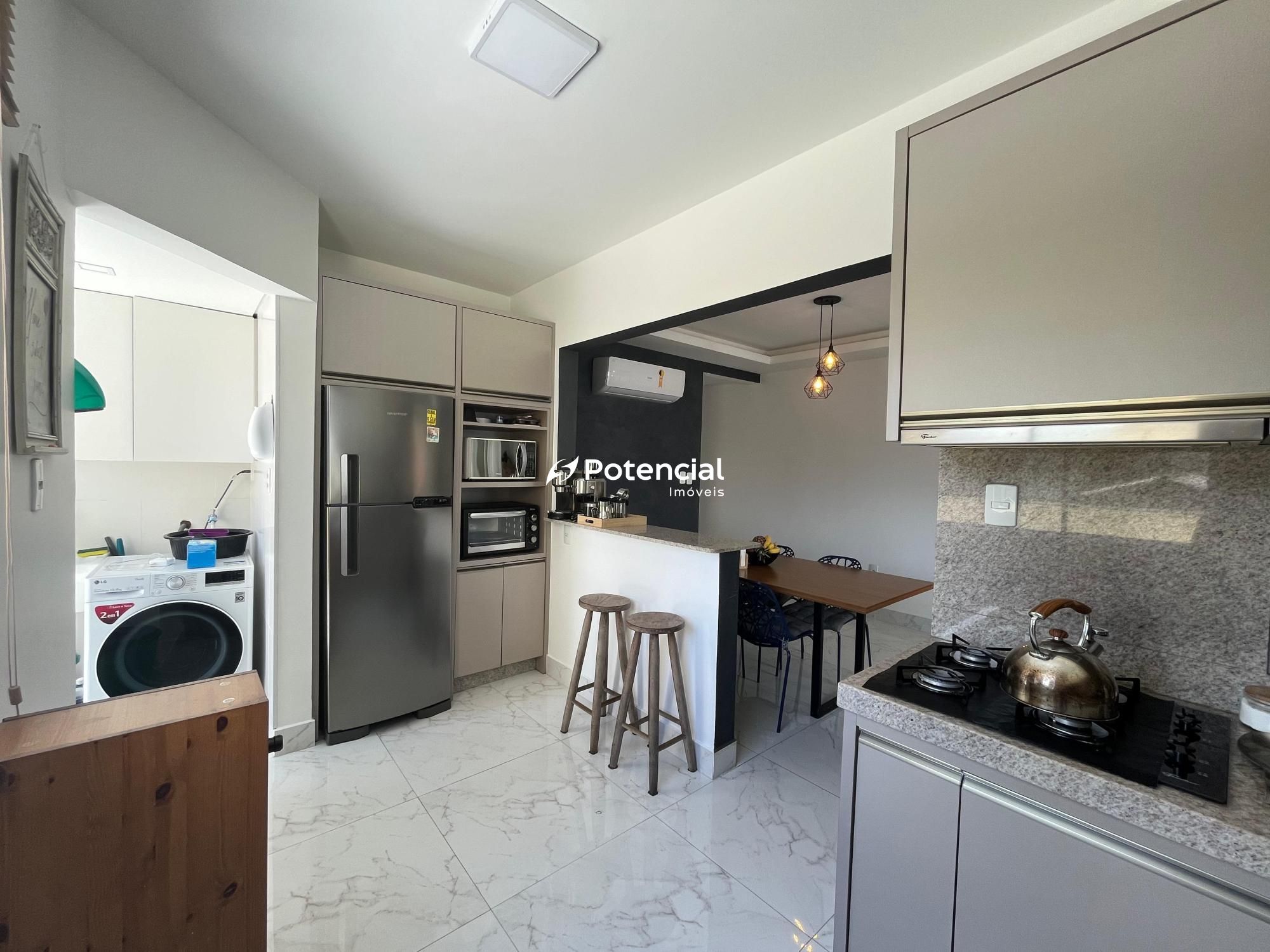 Cozinha vista da área de serviço - Residencial Morada Regia