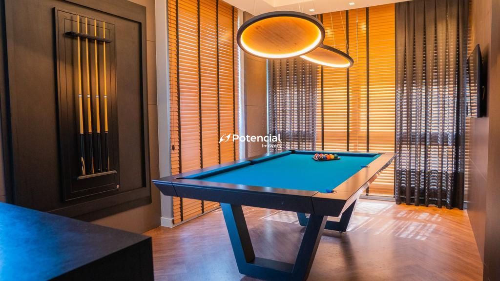 Sala de jogos com mesa de snooker l Hexsel Residence
