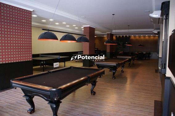 Mesas de pingpong e snooker na sala de jogos Atlantic Paradise Towers