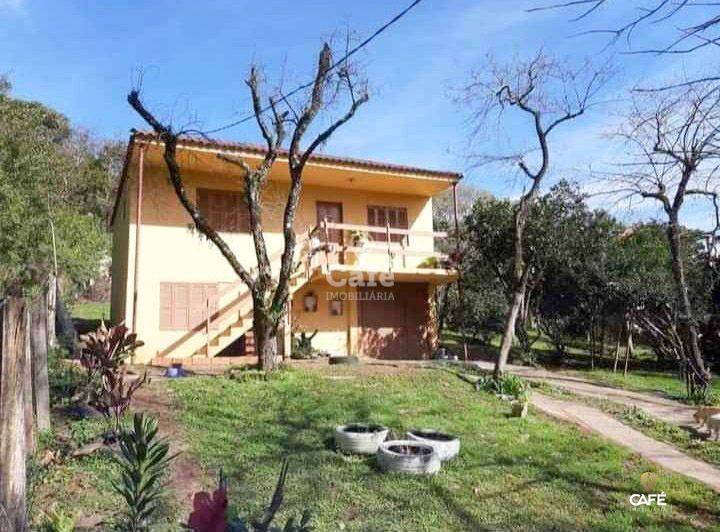 Casa à venda com 3 quartos, 100m² - Foto 1