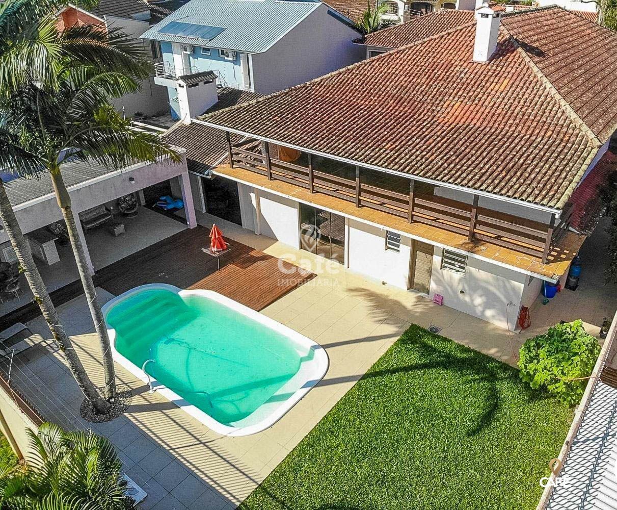 Casa para alugar com 6 quartos, 485m² - Foto 1