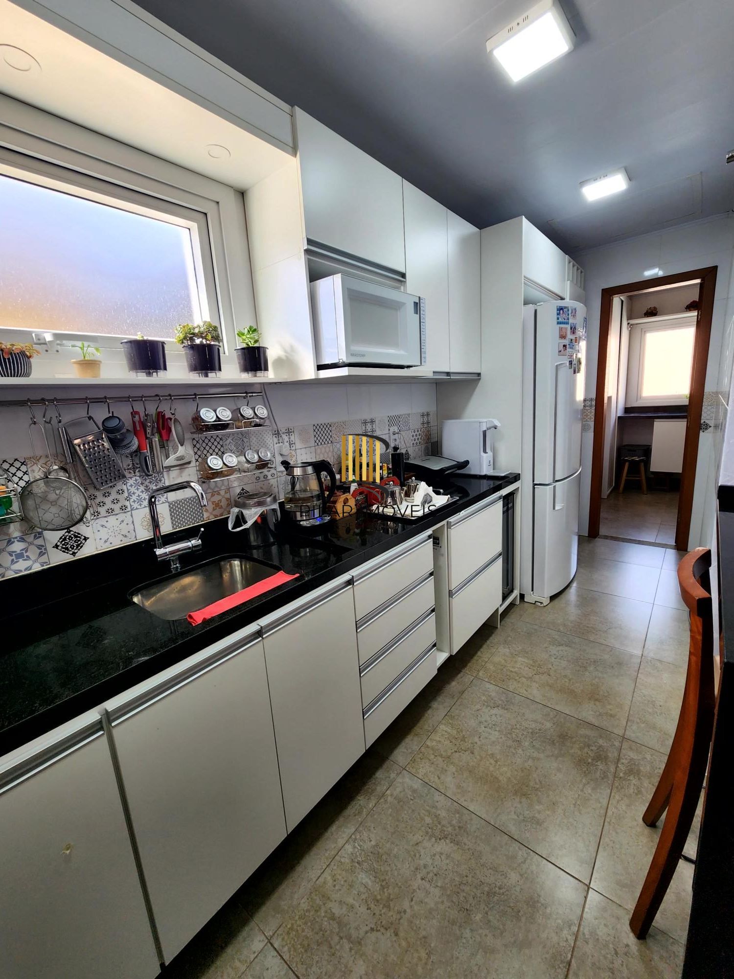 Casa com 2 dormitórios, suíte, piscina e espaço gourmet no Jardim Algarve