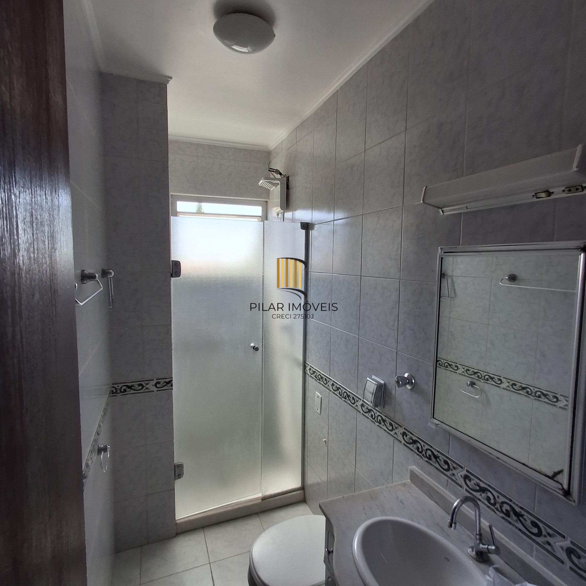 Apartamento no bairro Auxiliadora de 3 dormitórios e vaga