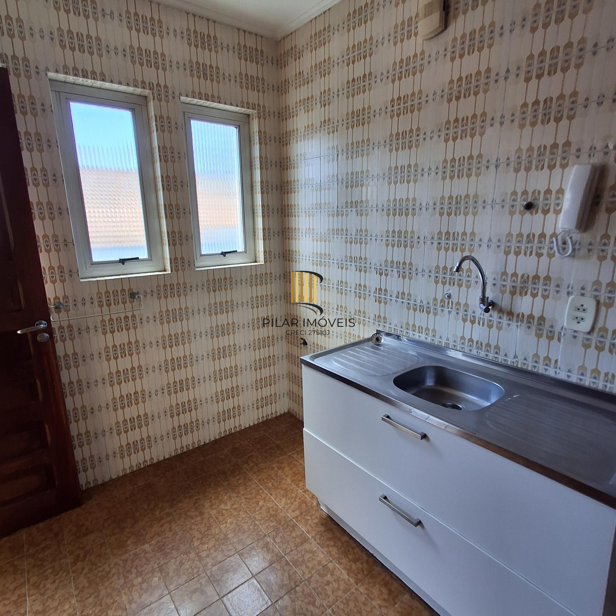 Apartamento no bairro Auxiliadora de 3 dormitórios e vaga