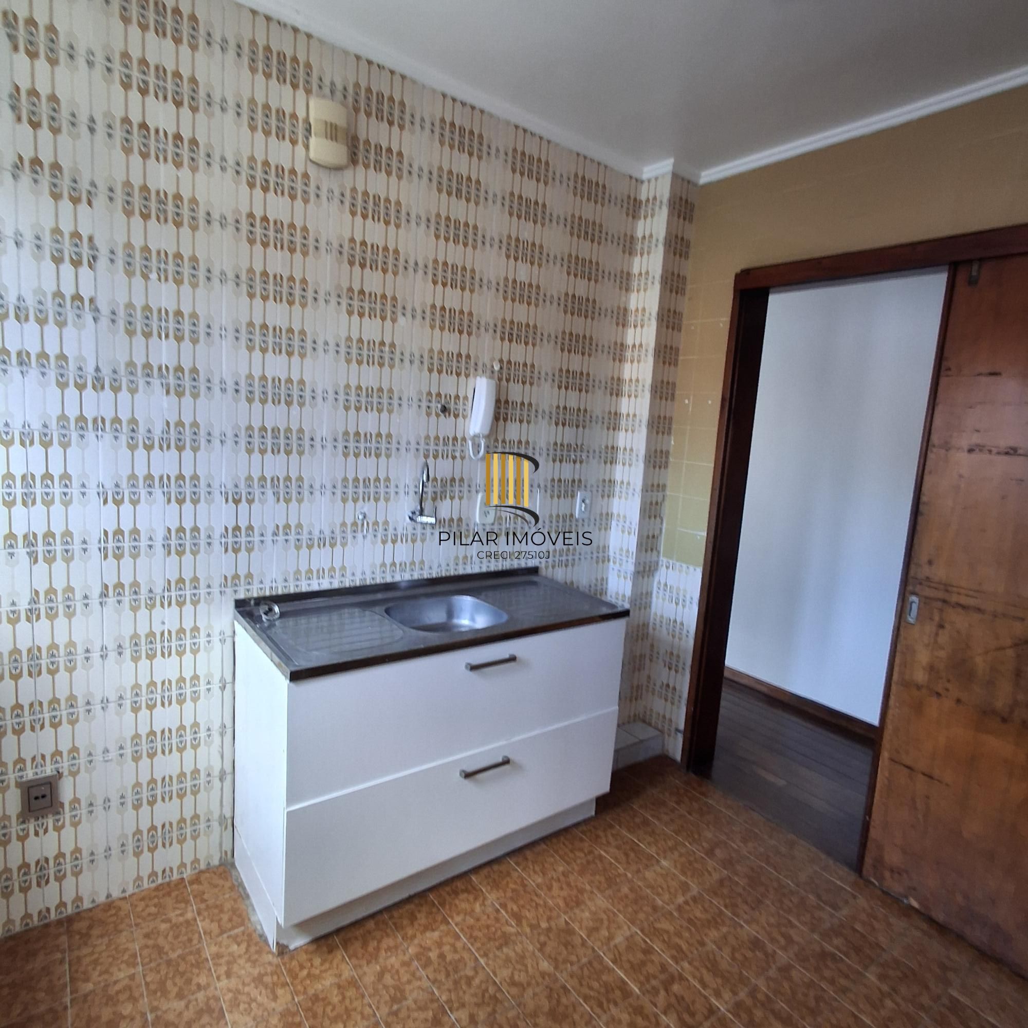 Apartamento no bairro Auxiliadora de 3 dormitórios e vaga