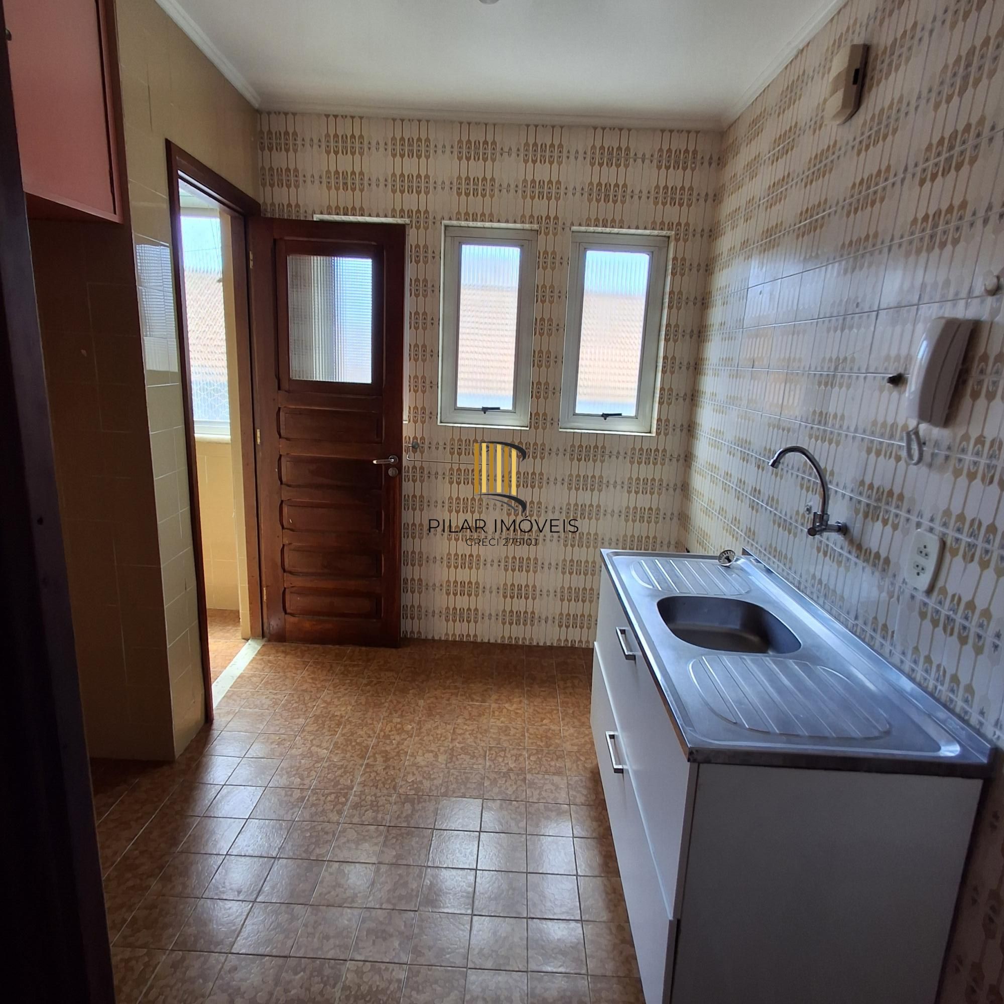 Apartamento no bairro Auxiliadora de 3 dormitórios e vaga