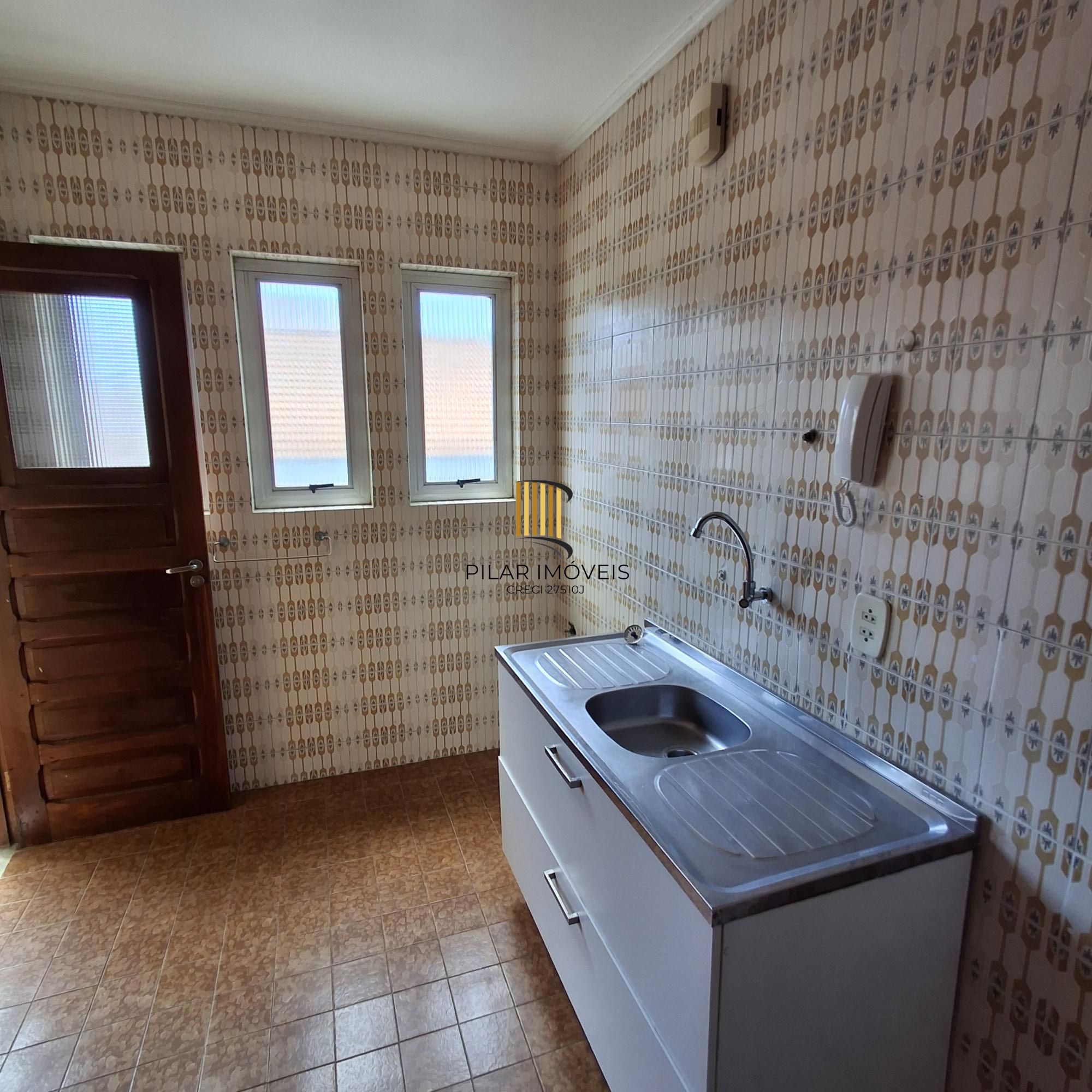 Apartamento no bairro Auxiliadora de 3 dormitórios e vaga