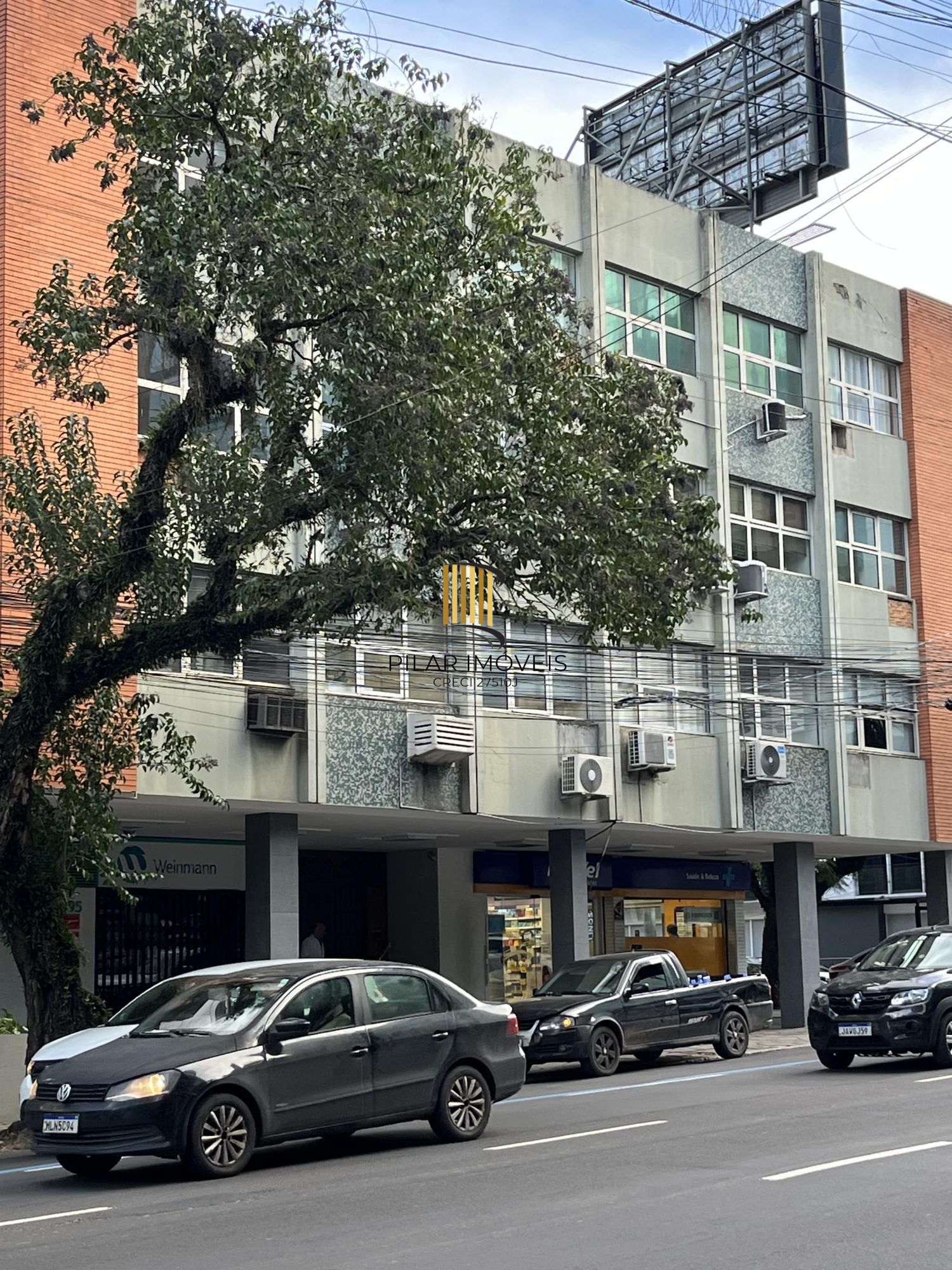sala comercial grande prédio com elevador no bairro Rio Branco em Porto Alegre