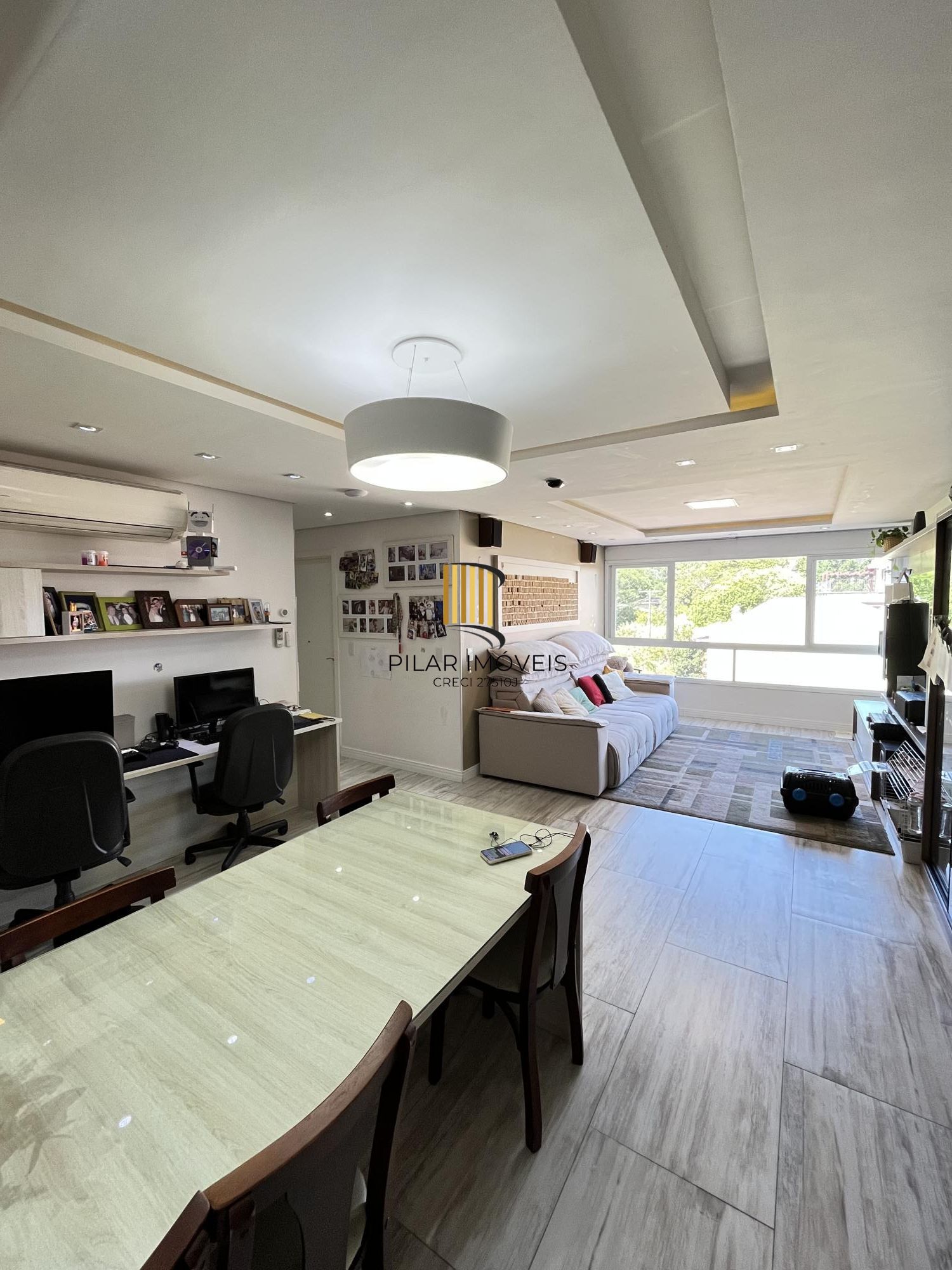 Apartamento de 3 quartos, 2 suítes e 2 vagas de garagem no Menino Deus em POA/RS