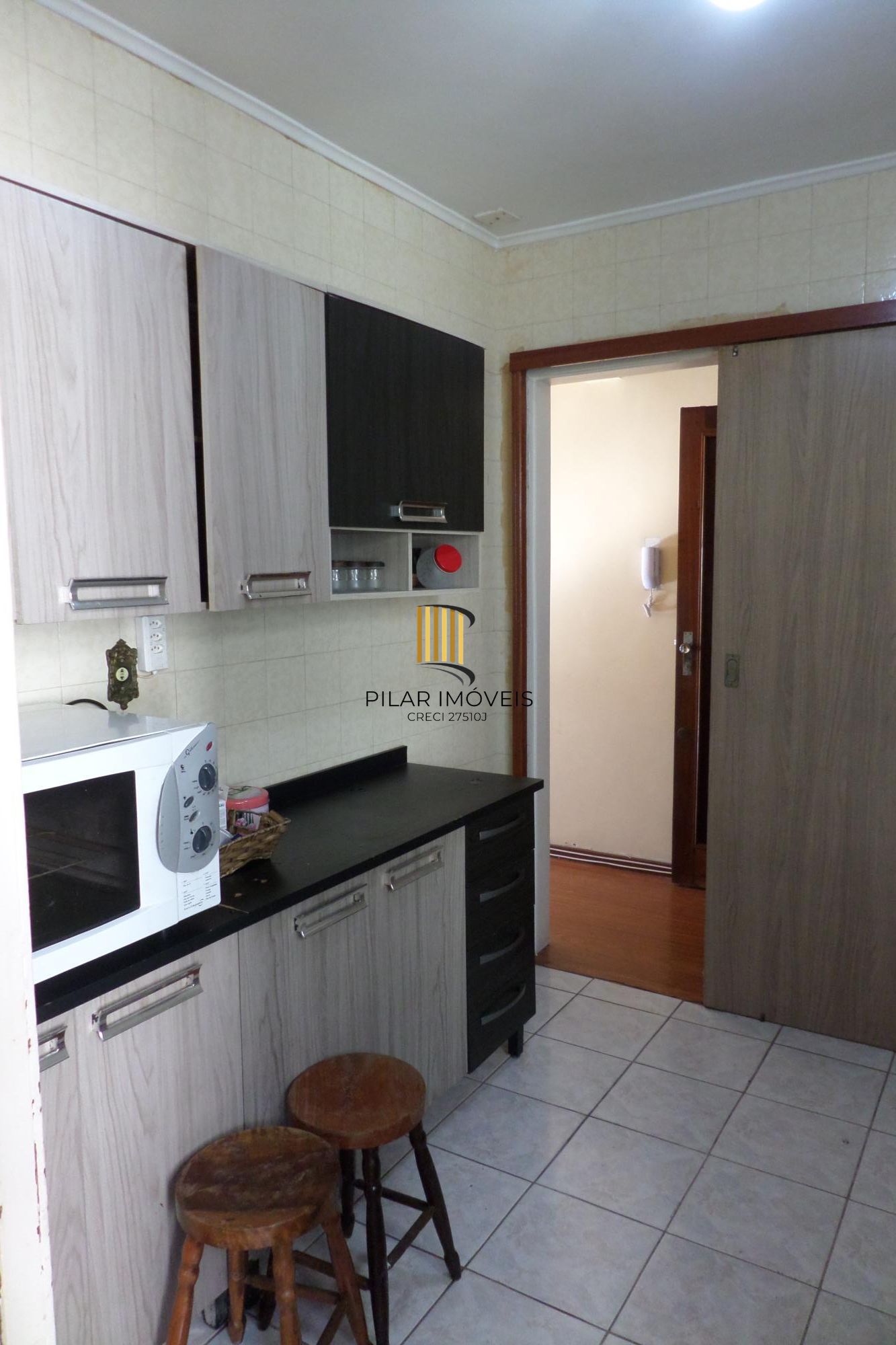Apartamento no Centro de 2 dormitórios dependência DESOCUPADO