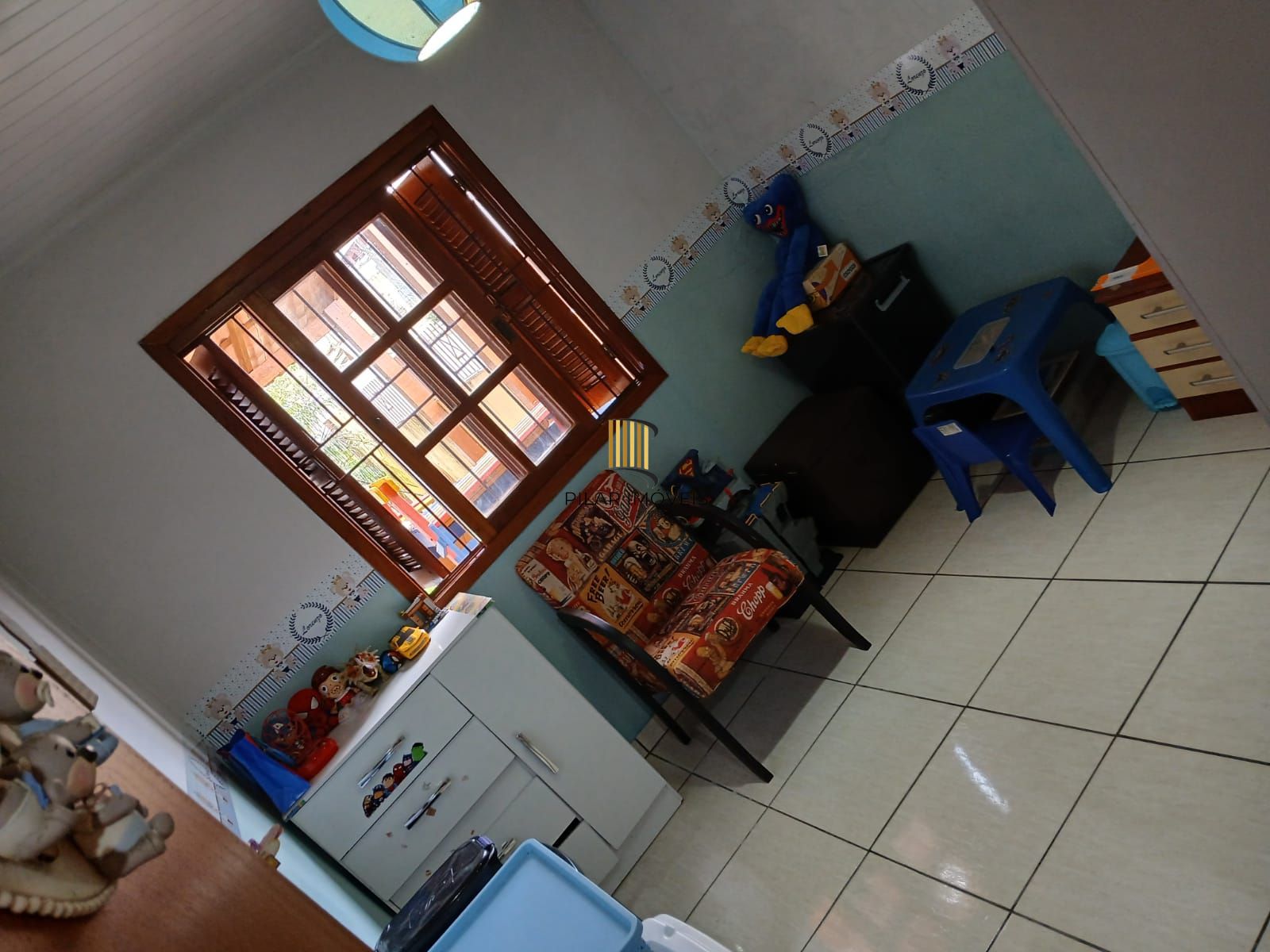 Casa de 2 dormitórios, 2 banheiros para venda no Jardim Algarve em Alvorada/RS.