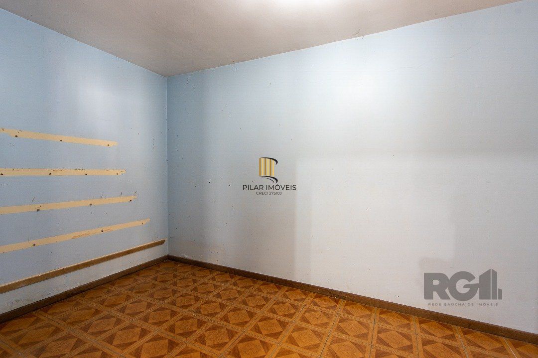 Casa 5 dormitórios no bairro Ipanema