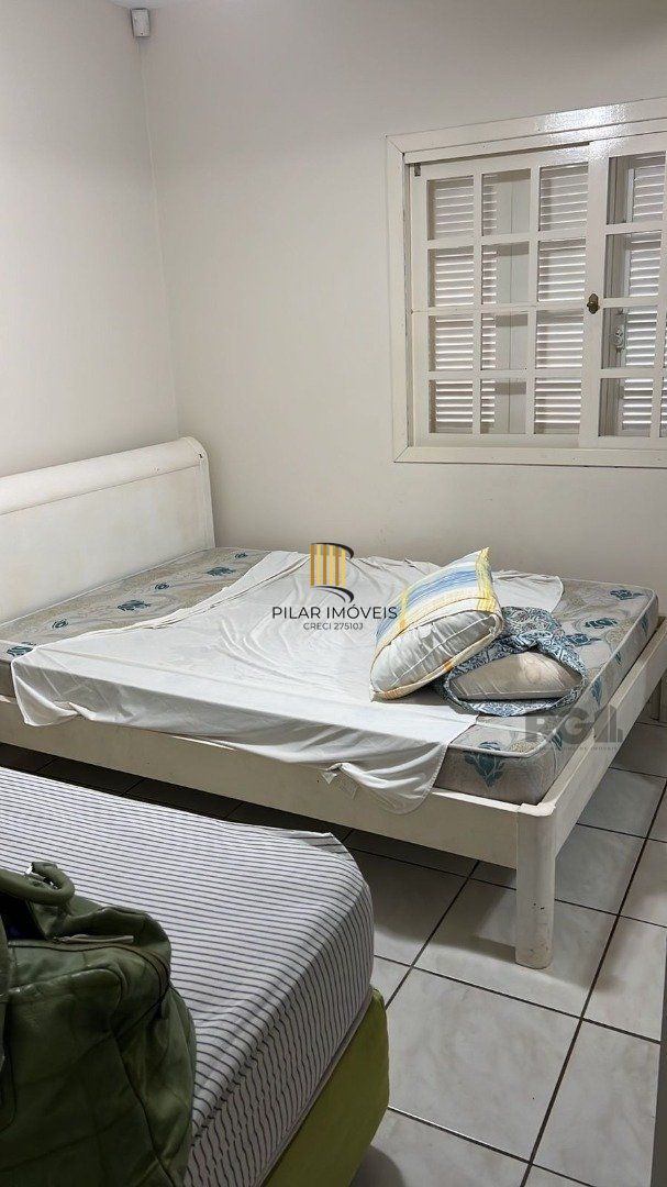 Casa 5 dormitórios no bairro Atlântida