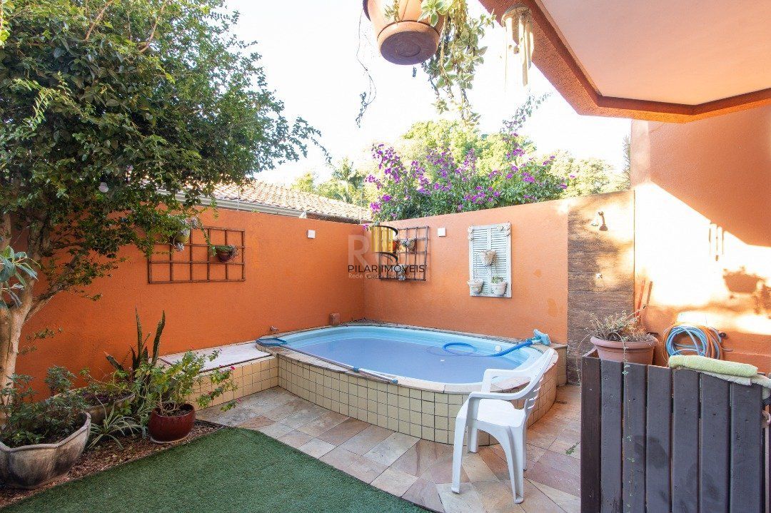 Casa de Condomínio 4 dormitórios no bairro Vila Assunção