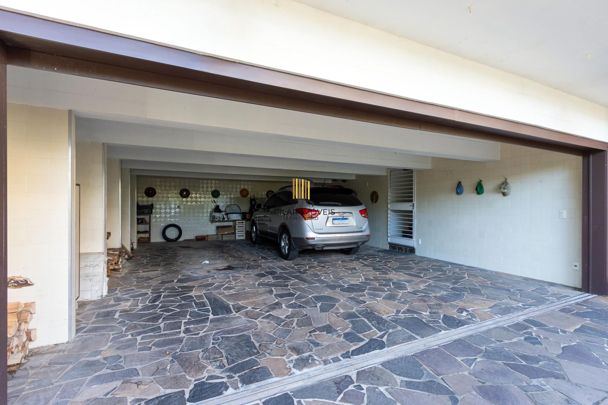 Casa de Condomínio 4 dormitórios no bairro Cavalhada