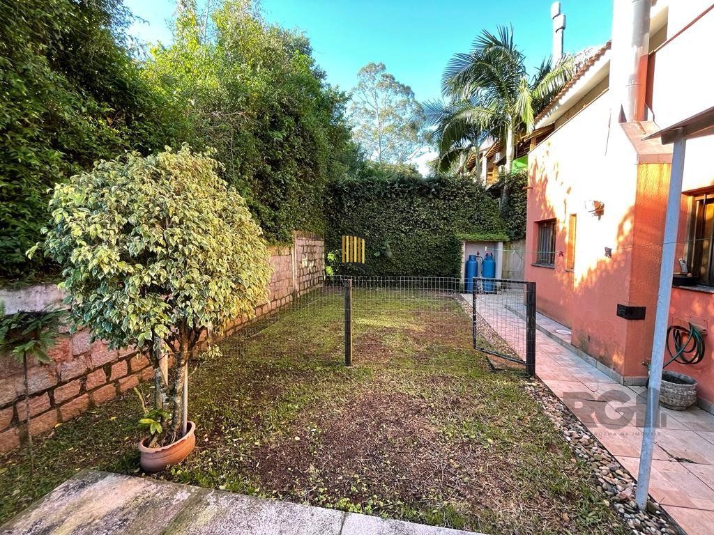 Casa de Condomínio 4 dormitórios no bairro Cavalhada