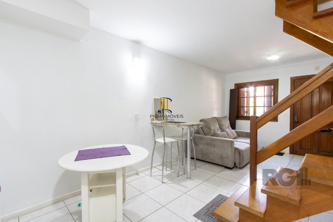 Casa de Condomínio 3 dormitórios no bairro Camaquã