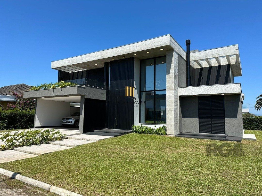 Casa de Condomínio 4 dormitórios no bairro Atlântida - Pilar Imóveis