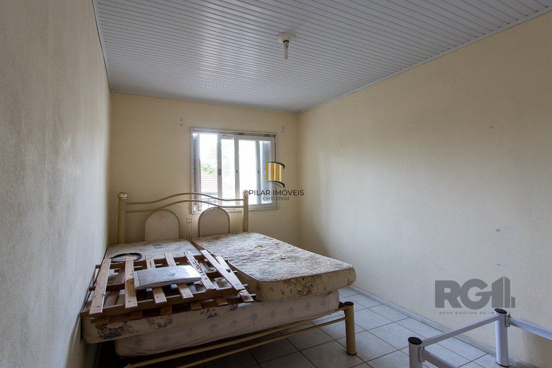 Casa 5 dormitórios no bairro Ipanema
