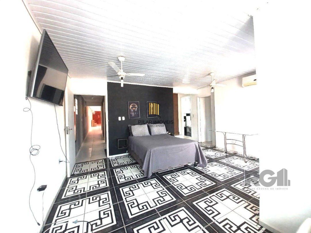 Casa 4 dormitórios no bairro Navegantes